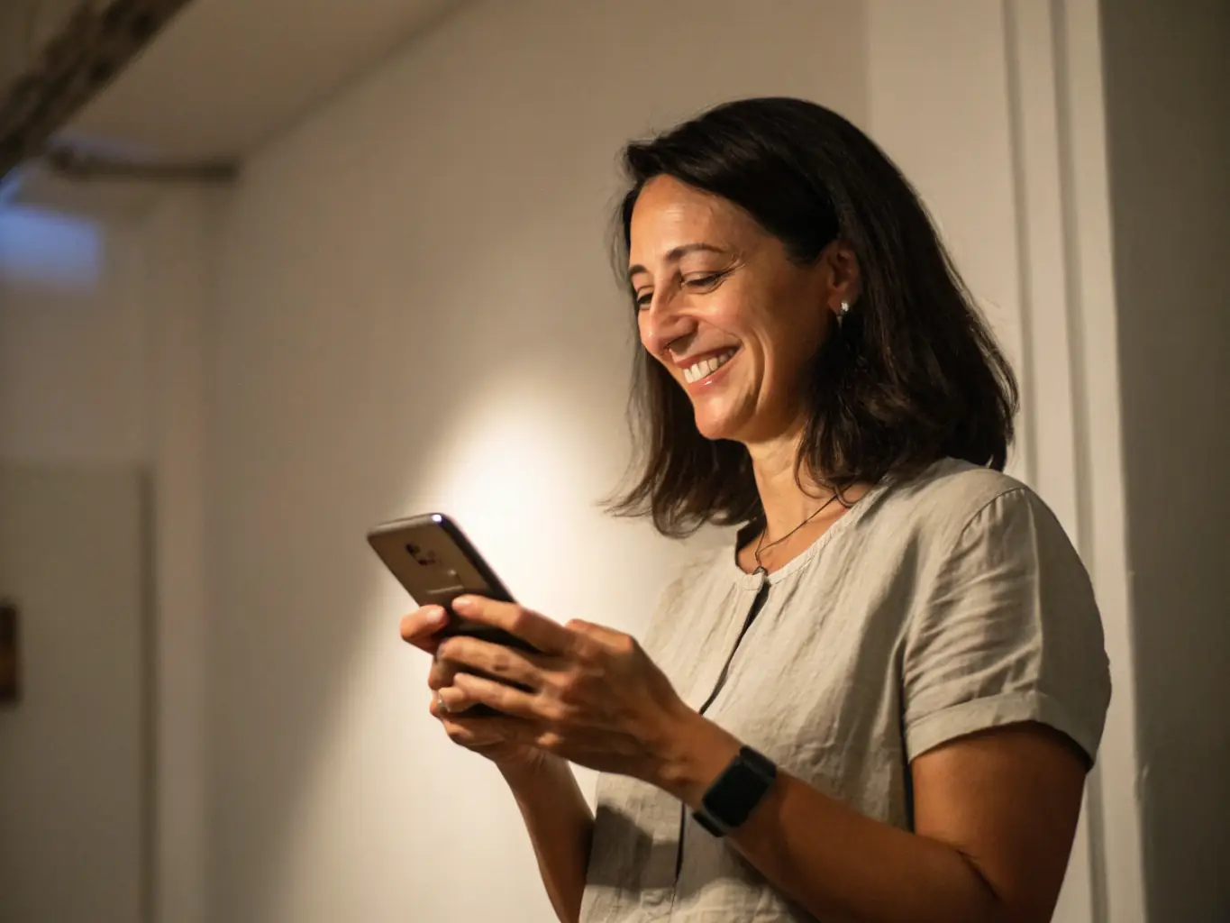 A person using a mobile banking app on their smartphone, showcasing the convenience and accessibility of mobile finance.